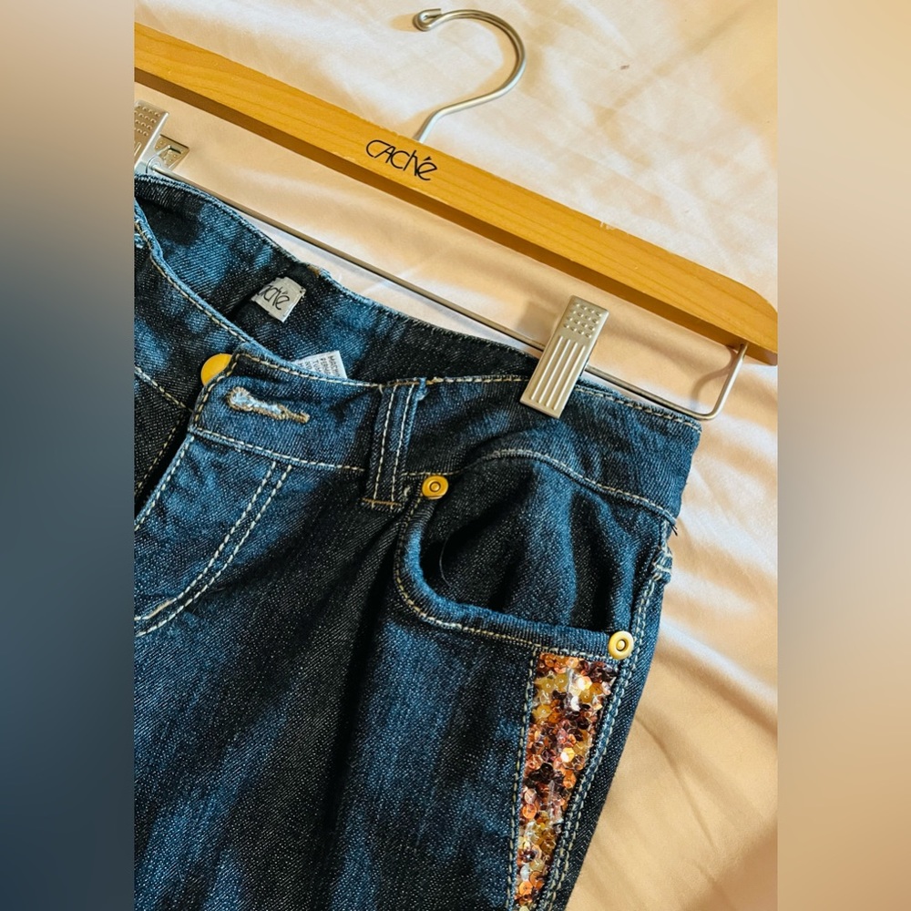 Denim Cache fitted jacket/wide leg pants set with  leopard sequins throughout.